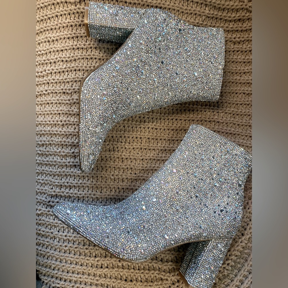 size 6.5 Betsy Johnson silver rhinestone booties. Never worn only tried on.